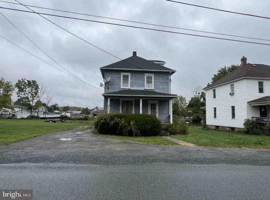Built in 1925, this two story home offers approximately 1365 finished square feet, three bedrooms and one full bath, unfinished basement and covered front porch. This home sits on an approximate 8712 sqft lot.