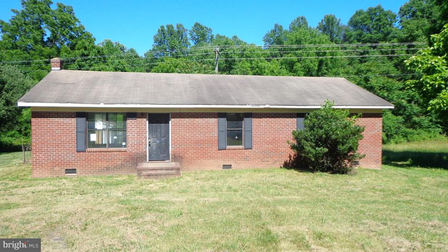Quaint Rancher with lots of potential and just minutes from town! Home sold "AS-IS."