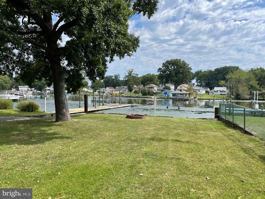 70 Ft Wide Waterfront situated on .579 of an Acre located  on  Beautiful Bear Creek.  Stake survey has been completed and the  New markers are in place.  Offering a 2 Bedroom  house with a full bath.  Laminate flooring  throughout and the appliances are staying.  House has central air and oil heat with large side porch. Property being Sold in AS IS condition.  Seller will not do any repairs. House has been a rental for several years and has a Lead  free certification. Beautiful Lot with Pier and Boat Ramp to launch your watercraft. Garage near the bulkhead is included and the shed also stays that is located by the house.  Long driveway with multiple Vehicle  parking.   Seller is unsure of the length of the pier at this time. They believe it has a mean low tide of  3 ft.  Buyers responsibility to verify how deep the water is and if flood insurance is needed. Current owners were not required to purchase flood insurance.