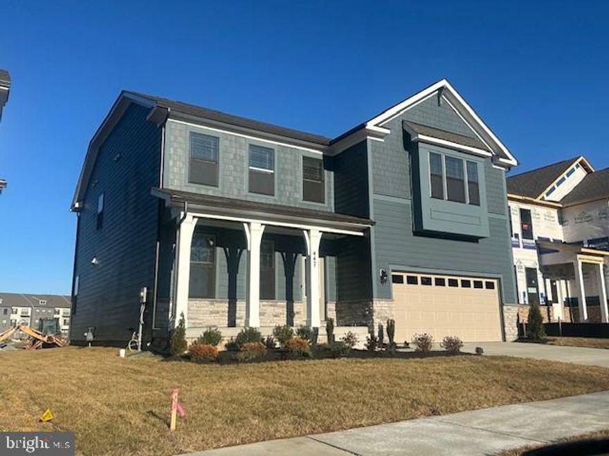 Discover your dream home in the Summit Plan at Renn Quarter. this magnificent 3,947 sq ft quick move in, new construction home is meticulously designed for modern living. Located in an amenity-rich community just a mile from Downtown Frederick, this home seamlessly blends timeless elegance with contemporary comforts. Enjoy expansive living spaces, including a fully finished basement, a versatile loft, and a private tree lined backyard perfect for gatherings. The main level features an open-concept design with a desirable main-level bedroom and full bath. Prepare culinary delights in the designer kitchen, showcasing quartz countertops, stainless steel appliances, soft-close cabinetry, a large island, and a walk-in pantry – all included. Upgraded flooring and abundant natural light enhance the home's elegant finishes. The upstairs loft offers endless possibilities, while the luxurious primary suite provides a serene retreat with dual walk-in closets and a spa-inspired en-suite bath. The finished basement presents ample space for recreation, guests, a home gym, or a media room. Enjoy the convenience of a two-car garage with EV ready outlet, smart home features, and energy-efficient systems. community amenities, such as pools, dog parks, tot lots, and walking trails with planned Downtown Frederick access and commercial space further elevate the lifestyle.  Inquire about special builder incentives.