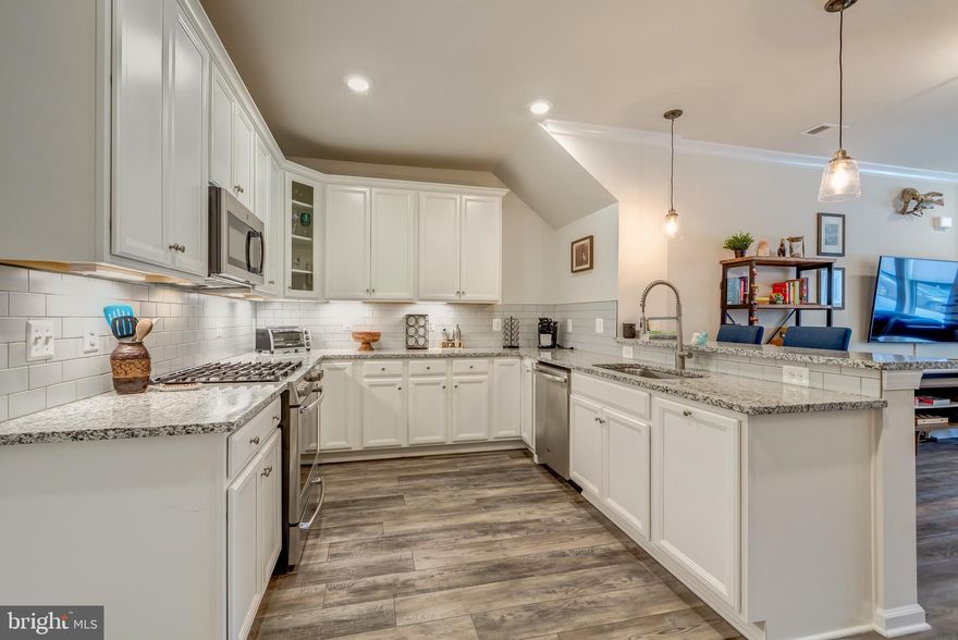 One Car Garage 2 Level  Condo Townhouse Built in 2019 .    Property has 3 Bedrooms, 2.5 Bathrooms,  Gourmet Kitchen, Stainless Steel Appliances, Wood floors on the  Main Level and Stairs .  Close to One Loudoun, Rt 28, Rt 7 and about 10-15 mins to Dulles Airport.