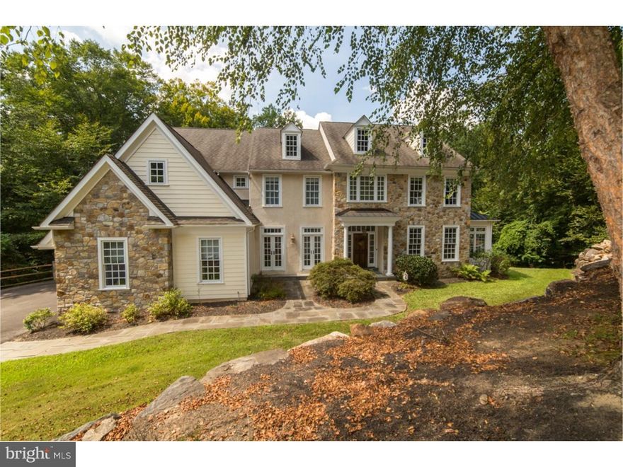 Located in MARPLE TWP, you will fall in love with this charming 2-story colonial with spectacular panoramic views of Trout Run Creek.  This 4 bedroom, 4 1/2 bath home with a 3 car garage will give you 5,120 sq feet of generous space to move about without losing that quaint, cozy atmosphere when its time to cuddle up by one of the 3 fireplaces.  The custom kitchen offers GE Monogram stainless appliances including dual ovens and indoor grill. Lavish cherry random width hardwood flooring, an inviting breakfast room leading into the family room with built-ins, floor to ceiling fireplace and decorative beams.  French doors off the formal dining room lead to a tranquil courtyard.  Custom mill work throughout adds the finishing touch to this amazing home.  Enjoy the formal living room leading to a sun-filled garden room with "country brick" floor.  Master suite and sitting room share a see-through fireplace, walk-in closets, dressing room, Jacuzzi and European step-in shower. Finishing this floor is a guest suite with private shower and two additional large bedrooms sharing a Jack & Jill bath. Lower level is a Massive finished basement and private entrance, the perfect setting for an in-law or au pair suite,