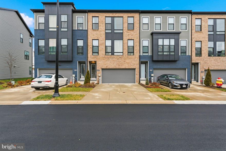 Spacious, move-in ready three-level townhome located in the highly sought-after South Lake community. This beautifully maintained residence offers 3 bedrooms, 2 full bathrooms, and 2 half bathrooms, thoughtfully designed for both comfort and functionality.

The main level features a modern, open-concept kitchen complete with quartz countertops, stainless steel appliances, and ample cabinetry, ideal for everyday living and entertaining. The primary suite boasts two walk-in closets and a private ensuite bath, providing a true retreat.

Additional highlights include a fully finished lower level, perfect for a home office, gym, or recreation space, a private deck for outdoor enjoyment, and a 2-car garage for convenient parking and storage.

Residents enjoy access to resort-style community amenities, including a swimming pool, community center, walking trails, and close proximity to shopping, dining, and major commuter routes.

Available for immediate occupancy.