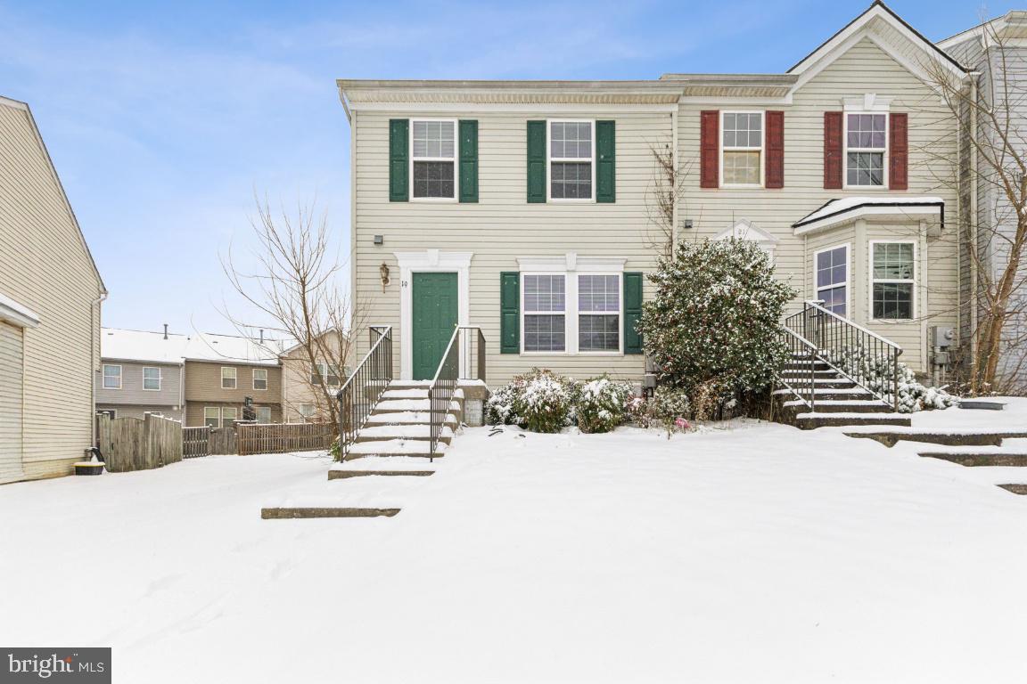 Move in ready end unit! Renovated kitchen opens to light filled family room and directly out onto your private deck. Backyard is completely fenced and ready to welcome your pets. Fully finished lower level boasts large recreation room and additional room perfect for an office or movie room. Upstairs has 3 generous bedrooms including large master suite and oversized master bath. Freshly painted throughout!!
