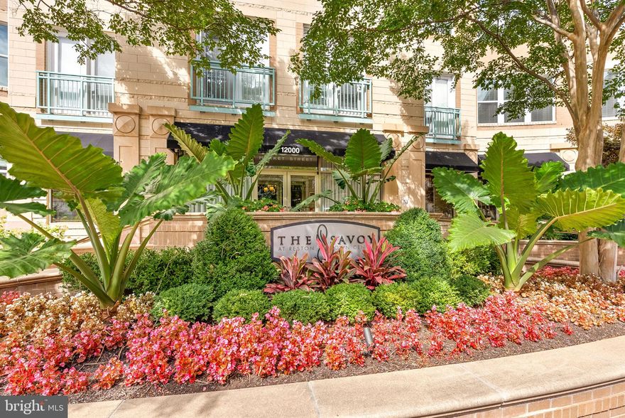 LUXURIOUS 4TH FLOOR UNIT IN PRIME RESTON LOCATION!

Experience unparalleled luxury in this rare 4th floor unit, where modern design meets exquisite finishes. With soaring cathedral ceilings, this spacious residence offers a contemporary kitchen adorned with a stylish stove hood, extended cabinetry, stainless steel appliances, and a convenient trash compactor. The textured, honed granite countertops provide ample space for entertaining or intimate evenings.

The living area boasts custom cabinetry and a modern gas fireplace, with discreetly hidden wiring for a clean aesthetic. Enjoy built-in audio speakers in both the living room and main bedroom for an immersive experience. Hosting guests? A cleverly designed Murphy bed is integrated into the storage closet, offering convenience without sacrificing style. Custom window shades adorn the glass doors and transom window, allowing the beautiful morning light to filter in.

The main bedroom features built-in cabinetry and a custom Elfa closet system, with an attached bath that radiates luxury, featuring a lighted mirror, walk-in tiled shower, and floating vanity, complemented by an elegant European toilet fixture.

Ascend to the second bedroom via stainless steel cable railings, which leads to additional storage and a beautifully remodeled bathroom, complete with an anti-fogging mirror, floating cabinet, and a jetted, heated soaking tub—designed for ultimate relaxation.

BUILDING AMENITIES
This meticulously maintained building offers a wealth of amenities, including:

* Controlled Access for guests
* Concierge Front Desk
* Business Center
* Clubhouse
* Fitness Center
* Pool
* Game Room
* Media Center/Movie Theater
* Sundeck with cabana and grill
* Picnic Area
* Prime Location

Step outside to enjoy family parks and trails leading to the W&OD bike path, with convenient access to a variety of dining options, including notable steakhouses like Ruth's Chris and Morton's, as well as Starbucks and local favorites. A new Whole Foods is under construction that is only a short walk away.  Explore the vibrant Reston Town Center, offering casual to fine dining, shopping, and seasonal events like fountain shows and ice skating.

With easy access to Wiehle-Reston East Metro, Dulles Metro Station, commuter buses, the Toll Road, and the Fairfax County Parkway, this unit truly offers the perfect blend of luxury and location.

Don't miss your chance to experience this exceptional property—schedule a tour today!