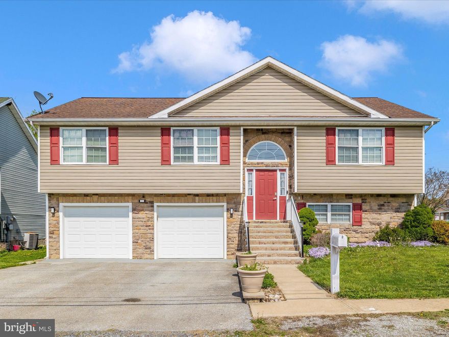Welcome to this charming 4-bedroom, 4-bathroom split-level home in the heart of Ranson! This well-maintained single-family home features a beautiful stone front, a spacious layout, and a 2-car garage with ample off-street parking. The kitchen boasts granite countertops, stainless steel appliances, and crisp white cabinetry, creating a clean and modern feel. The living room is warm and inviting with an upgraded electric fireplace, perfect for cozy evenings at home. Step outside to enjoy a very spacious, fully fenced backyard—great for entertaining or relaxing—plus a rear deck ideal for summer nights. The home is also equipped with smart outdoor lighting you can control from your phone, with color options perfect for holidays or setting the mood. Located just minutes from downtown Charles Town, where you can explore locally owned shops, restaurants, and historic sites. Enjoy outdoor adventures in Harpers Ferry, including hiking on the Appalachian Trail, whitewater rafting, and tubing. With major commuter routes nearby, commuting is a breeze! Recent updates include a brand-new water heater. Come see it for yourself and fall in love with your new home!