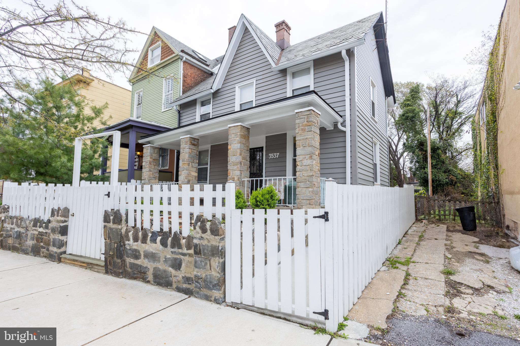 New Price! Now $279,000! Welcome to 3537 Greenmount Ave — a spacious, beautifully updated detached home in the heart of Baltimore! Just north of 35th Street, this 3-bedroom charmer offers the perfect mix of historic character and modern upgrades.
Step onto the inviting stone-covered front porch and into a bright, airy home featuring refinished hardwood floors, soaring ceilings, and oversized rooms. The kitchen is a true highlight — a huge country-style space with ceramic tile flooring, perfect for gatherings. Enjoy the totally renovated main bathroom, restored chimney, brand-new radiators, fresh paint, and major improvements including new siding, stylish fencing, updated flooring, and a remodeled primary bath.
Outside, you'll love the extra-large stone patio, brick shed for storage, and a fully fenced yard — ideal for pets, kids, and entertaining.
Move-in ready and packed with value, this home offers easy access to commuter routes, public transportation, shops, and parks. A rare opportunity at a fantastic new price — don’t miss your chance!