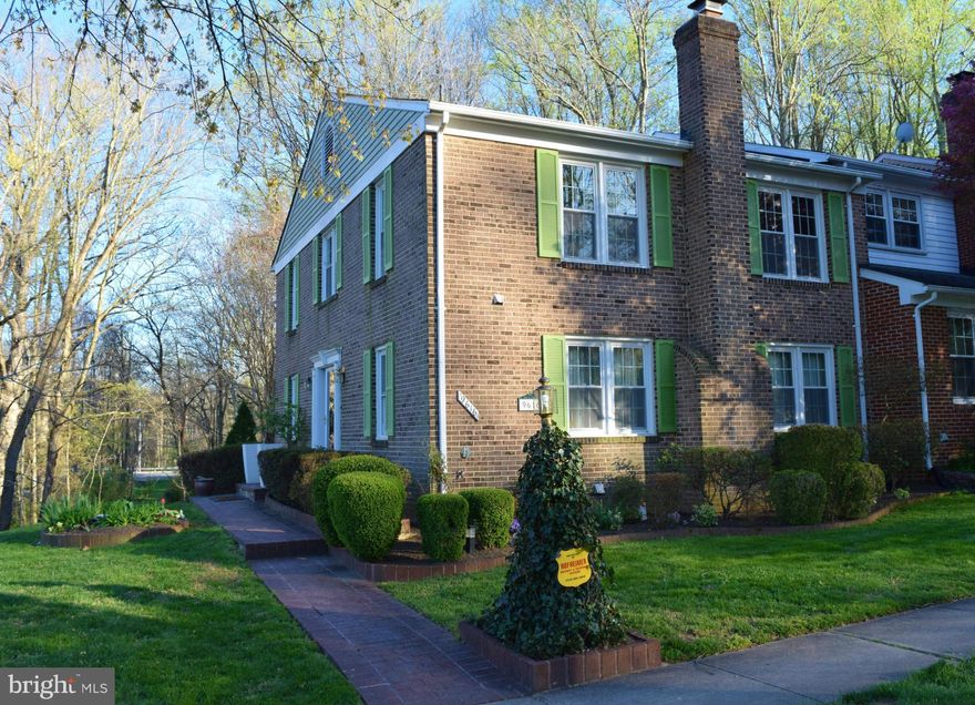 Gorgeous brick end unit TH w/ 4 light filled BR & 3.5 beautifully updated BA, stunning remodeled kitchen w/ breakfast bar & w/o to expansive deck backing to trees, hardwoods on 2 lvls, new paint, two story foyer, 3 fireplaces, rec. room & w/o to newly landscaped patio, updated HVAC & water heater, exercise area & lots of storage! Near shops, parks, play area, path to VRE. A must see!