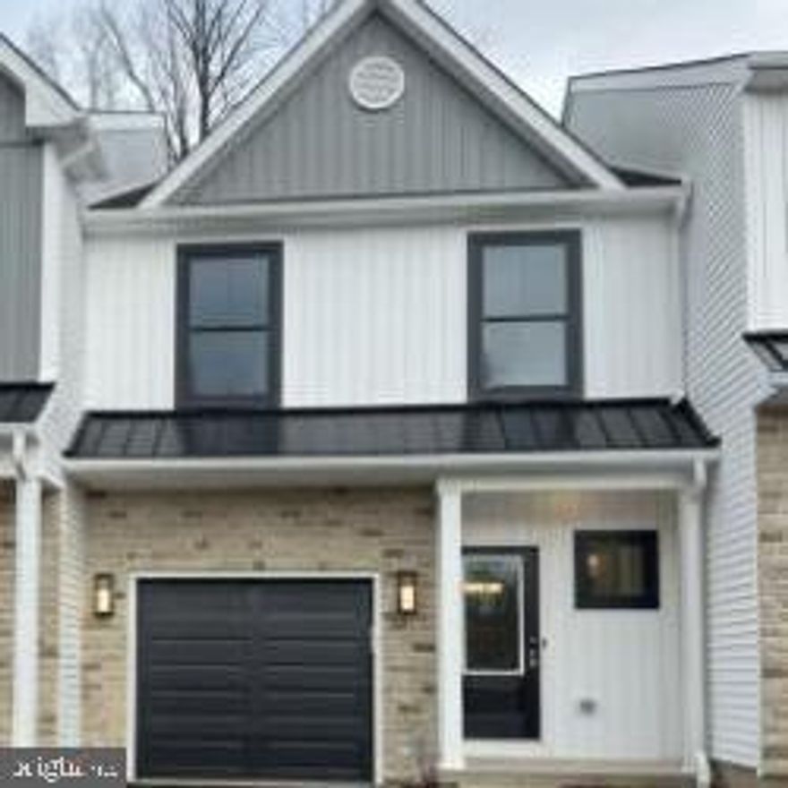 This Abington – JW plan luxury townhome offers low-maintenance modern living in a private enclave of unique townhomes with scenic Montgomery County surroundings. This new construction home is available for Quick Move in and features 3 bedrooms, 2 full bathrooms, 1 half bathroom, and an attached 1-car garage across two stories. 

The open and thoughtful layout includes a welcoming foyer, a powder room on the main level, and interior garage access. The designer kitchen showcases quartz countertops, 42″ soft-close cabinetry, stainless steel appliances, a large island with seating overhang, and a backsplash — all flowing into a spacious dining area and great room that are ideal for entertaining and everyday living. 

Upstairs, the owner’s suite delivers a private retreat with a large walk-in closet and a full bath featuring a double vanity and oversized tiled shower. Two additional bedrooms share a full hall bath, and a second-floor laundry area adds convenience.

Standard features & upgrades include: engineered hardwood flooring, tile bath floors, recessed lighting, upgraded carpet padding, rough-ins for ceiling fans, and a finished basement area. The exterior offers a modern stone façade with composite Trex deck.

Located in the Fields at Jacobs Way, a peaceful 42-home community in Harleysville, PA, enjoy scenic views, walkability to parks and shopping, and convenient access to Routes 63, 113, and the PA Turnpike.  Schedule your personalized tour today!