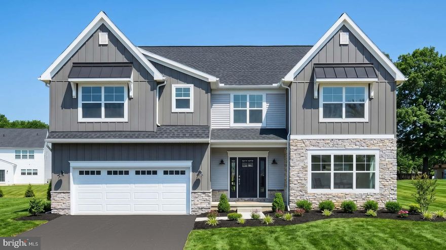 This thoughtfully designed 2-story home with 5 bedrooms, including one on the first floor, features 9’ ceilings on the first floor and stylish vinyl plank flooring throughout the main living areas. The 2-car garage with an extra storage area opens to a mudroom complete with built-in lockers. The kitchen is well-equipped with stainless steel appliances, quartz countertops, a tile backsplash, and a large center island and pantry. The sunny dining area provides access to the rear patio, and the 2-story great room is warmed by a gas fireplace with stone surround. On the second floor, the owner’s suite includes a private bathroom with a tile shower, double bowl vanity and an expansive closet. Adjacent to the suite are 3 additional bedrooms, a full bathroom, laundry room and loft space.