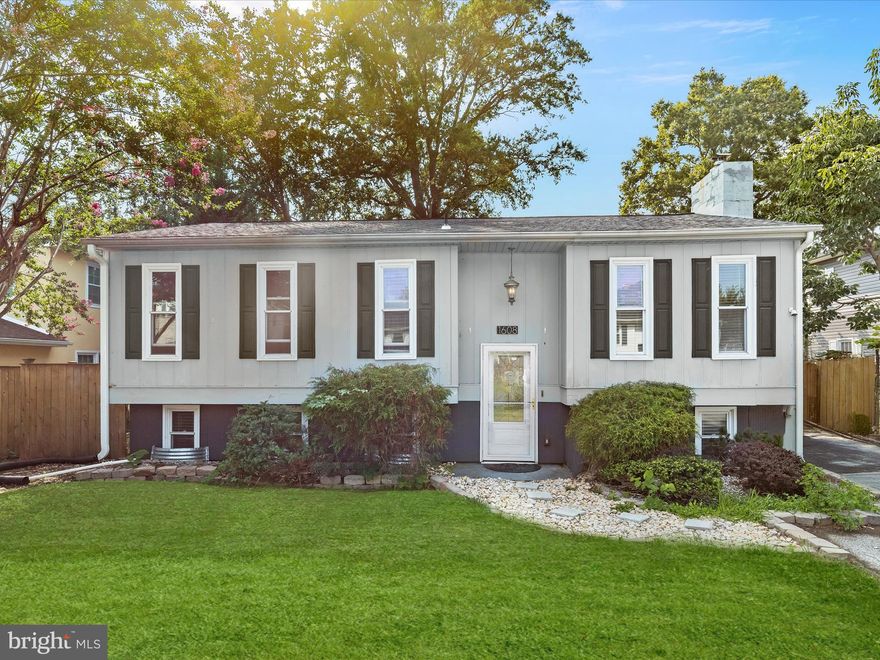 Welcome to this charming split-foyer home in the desirable Edgewater community, ideally located near Glebe Bay, Almshouse Creek, and the South River. Set on a spacious lot, the exterior offers inviting wood siding, a generous deck, and an in-ground pool perfect for entertaining or relaxing outdoors.  Inside, the open main level is filled with natural light and features easy-care laminate flooring. The kitchen seamlessly connects cooking and dining with a peninsula that allows for bar seating, ample storage, 36” cabinetry, butcher block counters, a stylish backsplash, and stainless steel appliances. The primary bedroom suite includes laminate flooring, a double sliding door closet, and an en-suite powder room with direct access to the backyard. Two additional bedrooms and a full hall bath complete this level.  The fully finished lower level expands your living space with a welcoming recreation room highlighted by luxury vinyl flooring, beadboard wainscoting, chair rail detailing, and a wood-burning stove with a stone surround. French doors open to a spacious bedroom suite with its own bath featuring dual vanities and a tub/shower combination, plus a convenient laundry area.  Enjoy a blend of comfort and convenience with easy access to major commuter routes, including US-50 and MD-2, offering a smooth connection to points both north and south.