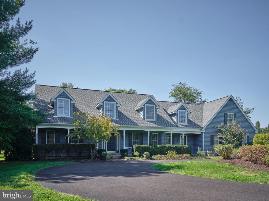 Welcome home to beautiful Bucks County and the opportunity it offers to own this lovely sprawling cape cod on over 3 acres. 1410 Holicong Rd. features over 4,000 sq. ft. of a versatile floor plan ready for multi-generational living or whatever may suit your particular needs.  A huge country kitchen with an island sized the same is perfect for large family gatherings. This kitchen is loaded with cherry cabinetry, wood flooring, a charming eating area with a wood burning fireplace and double doors out to the covered deck.  The main floor also features a formal dining room, an office off of the kitchen, and a spacious laundry/mudroom.  The great room has and additional wood burning raised hearth-stone fireplace, french doors out to the deck and vaulted ceiling with beamed trim. One of the more interesting features of the main living level is an in-law or guest suite totally created for wheelchair ease and access. This newly renovated bedroom and bath is just what your family may need. An abundance of large windows help bring the outdoors inside.  The second floor has an extraordinary master suite that has multiple closet options (walk-ins and cedar), a workout room, a sitting room, and french doors to a small deck overlooking the back lawns.  3 additional bedrooms complete the 2nd floor.  The basement has recently had extensive water proofing completed with documents available for your review.  The basement was finished decades ago with a bar for entertaining and a delightful wine closet  This stately home needs carpet, bathroom, and basement updating but can not be over improved based on comparable sized homes with 3 plus acre lots in New Hope.  Easy to show and my pleasure to sell.