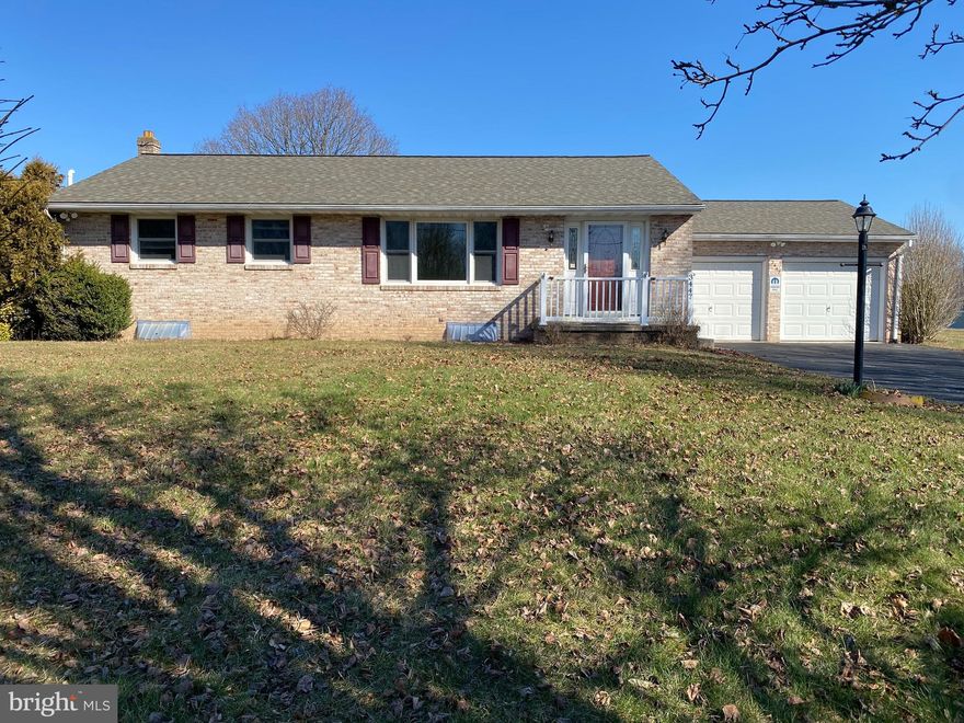 Adorable spacious all brick rancher sitting on a level .57 acre lot, backing to Bollinger Park which, currently in the development stages, will be a nature park. Plans include a walking / jogging / biking trail, a pollinator garden with apiary, and a meditation garden, with the possibility for an observatory constructed and operated by the Westminster Astronomical Society.  This 3 BR, 2 full BA home features fresh paint and new carpet throughout the main floor, vinyl replacement windows,  a Formal Dining Room with hardwood flooring and a Formal Living Room. The finished basement includes a Rec Room with oak built-ins, Family Room with a propane gas fireplace, an Office with built-in shelving, cabinets and a cedar closet, a Mud Room area, Laundry Room and a Workshop/Utility Room with a work bench. The roof was replaced in (approximately) 2019 and HVAC  in 2011. There is a huge deck overlooking the big level backyard as well as a large shed. The 2-car garage includes 2 auto-openers and additional room for storage.  The oversized blacktop driveway will hold multiple cars. Great country location yet minutes to small town Historic Taneytown which offers grocery/pharmacy shopping, great restaurants, the Stone House Cakery & Cafe, Deja Vu Jewels Co., Antrim 1844, a destination hotel, restaurant & event venue, antique and vintage shopping, 226 acres of parkland and more! Property is sold As-Is.