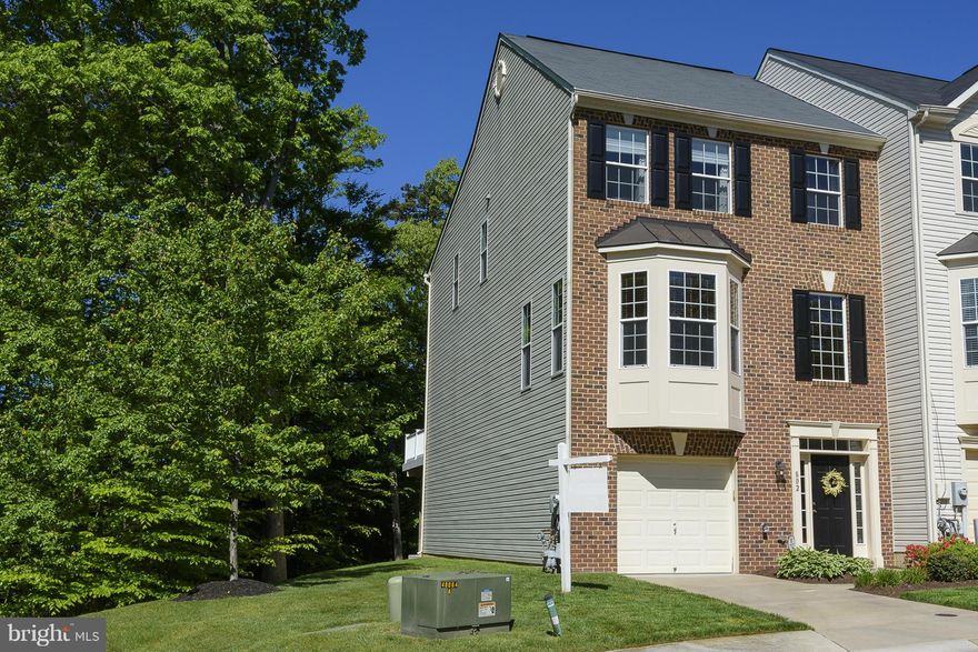 Gorgeous 3 Level end-unit TH in coveted Piney Orchard. Featuring a gourmet kitchen with silestone counters, hw floors and large kitchen island with seating. Master Suite has a walk-in closet and spacious bathroom with a soaking tub and sep shower. Community includes 3 outdoor swimming pools, a walking trail, community/fitness center and nature preserve with entrance next to neighborhood.