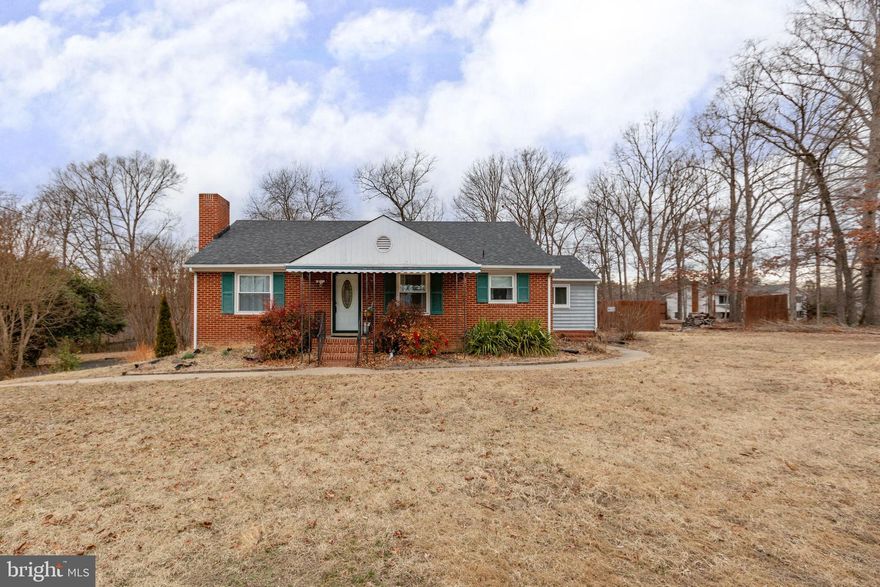 Major system updates and a rare one-acre lot just minutes from Downtown Fredericksburg make 80 Ferry Road an exceptional opportunity in a highly desirable location. Recent improvements include a new roof (2020), windows (2021), kitchen updates (2021), hot water heater (2022), HVAC (2024), and shed door replacement (2021), giving buyers peace of mind on the big-ticket items. Are you looking for a home with a second kitchen? This one has a great set up in the basement! Located on a hard-to-find acre so close to town, the property offers space, privacy, and a fully fenced backyard complete with a patio and storage shed, ideal for outdoor entertaining, gardening, or simply enjoying room to spread out. Inside, the home is full of warmth and character. Hardwood floors run throughout the entire main level, connecting a spacious family room with a cozy woodstove, a dedicated dining room, and a kitchen with timeless personality. Main-level bedrooms provide convenience, while the expansive sunroom addition offers flexible living space perfect for relaxing, working from home, or gathering with family and friends. The finished basement expands the home even further with a recreation room, kitchenette, full bathroom, generous storage, and an additional room currently used as a bedroom (not to code). The layout offers versatility for extended living, guests, or multi-use needs. With strong foundational updates, abundant character, and a rare acre in such a close-to-town setting, this property presents a wonderful opportunity to personalize and make it your own in the Fredericksburg area.
