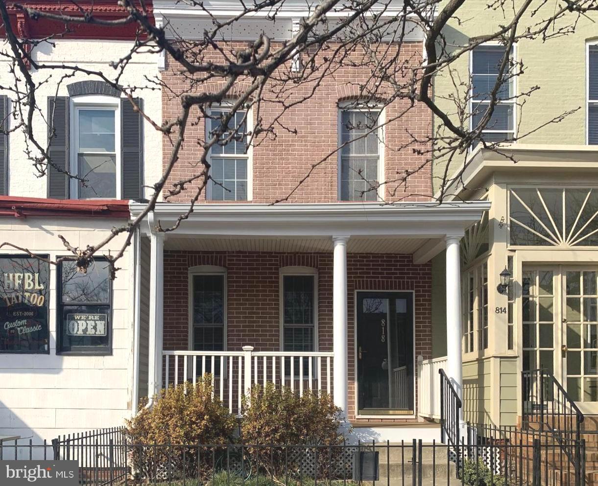 Stunning Home in the Heart of Hampden! This beautifully updated 3 bedroom, 2.5 bath home offers the perfect blend of historic charm and modern comfort—complete with a private two-car parking pad in the rear. Cute front porch for relaxing and enjoying the lively Hampden community. Step into a spacious, open-concept living area that flows seamlessly into a stylish kitchen featuring 42" cabinetry, granite countertops, spacious island and a breakfast bar—ideal for cooking and entertaining. Exposed stone walls add a distinctive character, while gleaming hardwood floors run throughout the home, enhancing its warm and inviting feel. Upstairs, you'll find three generous bedrooms and two full bathrooms, along with the added convenience of the washer and dryer. Just steps away from Hampden’s vibrant shops, cafes, and top restaurants. You're also only minutes from Johns Hopkins University, I-83, and downtown Baltimore—making this location as practical as it is charming. Tenant occupied with 24 hours notice required. Home will be professionally cleaned prior to a. new lease start date.