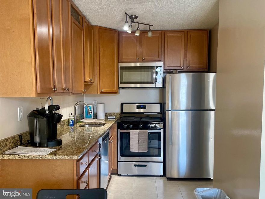 Welcome to 1607N a modern, charming, furnished 1 bedroom apartment in the prestigious Promenade Towers.  Oversized windows offer gorgeous, panoramic views!  The new floors are luxurious carefree, vinyl wood-grain wide plank floors.  The modern kitchen features all Whirlpool appliances, including a frost free refrigerator, gas stove, dishwasher, and microwave.  The kitchen also has granite counters and to the ceiling beautiful cabinets.  There is also a Keurig machine.  The renovated bathroom also has a granite counter.  The living room has a wall which is all window and sliding door to the balcony with the many treed view.  The closets are built out and some have mirrored doors.  Garage space parking included.  The building has so many amenities, it lives like a resort.  The lobby has just been completely redecorated.  The recently redecorated Arcade level has the state of the art fitness center with indoor pool, whirlpool and sauna.  Also, in the Arcade is Chef Tony’s restaurant ( a well known seafood/Italian eatery), a 
 dry cleaners, grocery store/deli, travel agent, beauty salon, resident lounge, party and conference rooms.  There is a huge outdoor pool with adjacent grills.  Tennis (lighted courts) and pickleball have their own building as you drive onto the property.  Ping pong is played regularly, as are social activities such as “Breakfast at Wimbleton” and wine and cheese parties in the lobby and the great New Year’s Eve party.  There are too many activities to mention them all.   A few are…trivia night, open mike night, game night, monthly first run movies, lectures and vaccinations.  We vote in national elections in the party room of the Promenade…how convenient is that?  There is meditation, exercise class, book club, canasta, bridge and Mah Jong.  The Promenade has car charging stations and a car washing area with a dynamite vacuum.  It is easy to get to the nearby Red Line Medical Center metro stop at NIH/Walter Reed. Bus come to the door of the building.  Close to 495 and 270.  Nearby Wildwood Shopping Center has Balduccis, DVS, Bethesda Bagels, Starbucks, a number of places to eat, and several cute boutiques.  Giant Food is across the street.