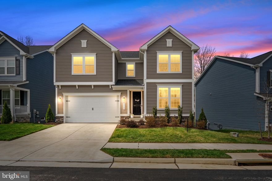 If you're looking for high-end finishes, virtually every upgrade - from fully finished basement, to gorgeous sunroom and main floor study/flex room - and the largest model in Harrison Village, 11509 Bluestem Way is the one. Built in 2023 and in immaculate, move-in-ready condition, this 5-bedroom, 4-bath home offers 4,244 square feet of beautifully designed finished space, backing to trees, ponds, and sunsets.

Open-concept layout, gourmet kitchen, massive walk-in pantry, brand-new Trex deck with built-in lighting, fully finished basement, and fenced backyard make it as functional as it is beautiful. With elevated landscaping and a like-new feel throughout, this home stands out for its size, style, and setting.