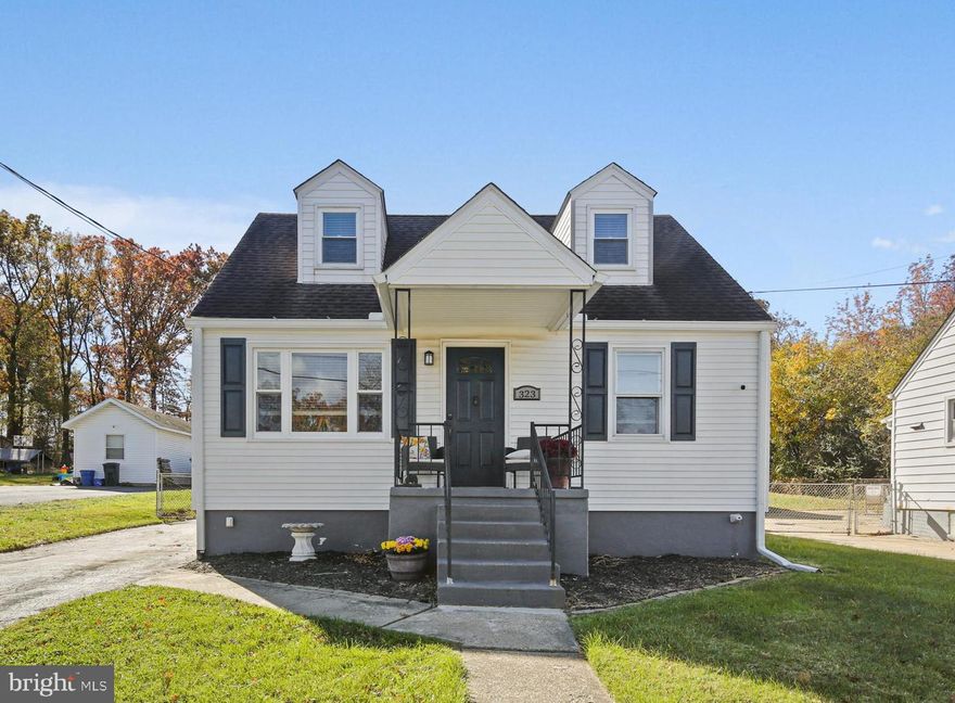 This beautifully renovated 3 bedroom & 2 full bath home with a detached garage and spacious fenced-in yard truly has it all! Step inside from the charming covered front porch and be welcomed by a bright, open living room that seamlessly connects to the kitchen—an ideal layout for gathering and entertaining. The updated kitchen features sleek stainless steel appliances, sparkling granite countertops, a stylish backsplash, and plenty of room for a breakfast table.

Two bedrooms and a full bath complete the main level. Upstairs, you’ll find the private primary suite, complete with an attached bath and a generous walk-in closet, offering the perfect retreat with ample space for all of your needs.

The finished lower level expands your living area with a large recreation room, a laundry room, and abundant storage options. A walk-up exit leads to the fully fenced backyard—your own outdoor oasis for play, gardening, or simply relaxing.

Conveniently located just minutes from I-95 and I-695, this home offers both comfort and accessibility. You won’t want to miss this one!