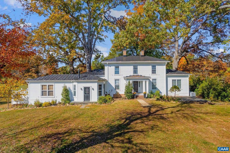 Historic 26-Acre Keswick, Virginia Horse Farm (Circa 1875) Welcome to a breathtaking Keswick, Virginia estate featuring a beautifully restored and renovated� 5-bed/ 3.5-bath manor house that seamlessly blends historic charm with modern amenities. Ideal for year round entertaining. The stunning� main home boasts a three-car garage, five fireplaces, a chef's kitchen, hard wood floors, a main-floor ensuite bedroom with a private patio and hot tub. A 922 sq ft 1 bed-1 bath guest cottage with wrap around deck completes this beautifully landscaped compound.The meticulously maintained property is an equestrian and nature lover?s dream, offering: 5 fully enclosed horse stable bays and 3 outdoor covered bays,Tack room, workshop, wash stall, run-in shed, hay storage, and equipment storage, Greenhouse, planting shed, an 80x80 enclosed organic garden, some clear and fully enclosed land suited for vines, a grazing meadow, chicken coop, walking trails and a community riding ring. Located in the  Hidden Hills community, the estate is just 30 minutes from downtown Charlottesville and convenient to D.C., Richmond, airports, shopping, vineyards, music venues, museums, University of Virginia. A perfect sanctuary for horse and nature enthusiasts.,Granite Counter,Wood Cabinets