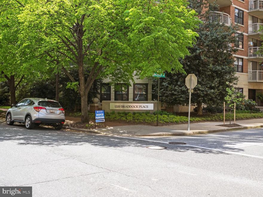 IMMEDIATE AVAILABILITY! Welcome to this large and lovely one bedroom condo in Braddock Place, which gleams in natural light, has a wide open floor plan, a spacious private balcony overlooking the community pool and hot tub, and includes one assigned parking space. Recently updated throughout with hardwood floors, beautiful new windows, and gorgeous granite counters and stainless appliances in the kitchen. The open floor plan has a dedicated dining area, along with a comfortable living space and even room for a small desk or reading nook. Head through the double French doors to the bedroom which includes a large walk-in closet, and an en-suite updated bathroom with a built-in linen cabinet. For convenience when entertaining, the bathroom can also be accessed from the living area through a small hallway where you'll also find the in-unit washer/dryer and a coat closet. The community amenities include a fitness center and sauna, community room for larger parties, on-site building manager, a large lobby with secure access and intercom system, and secure parking with one assigned space and additional visitor parking. Only steps to the Braddock Road Metro (yellow and blue lines), within blocks in every direction of the restaurants and shops in Old Town, and nearby Del Ray and Potomac Yard, and only minutes from the Amazon HQ2, the Pentagon, and DC! Cats OK!