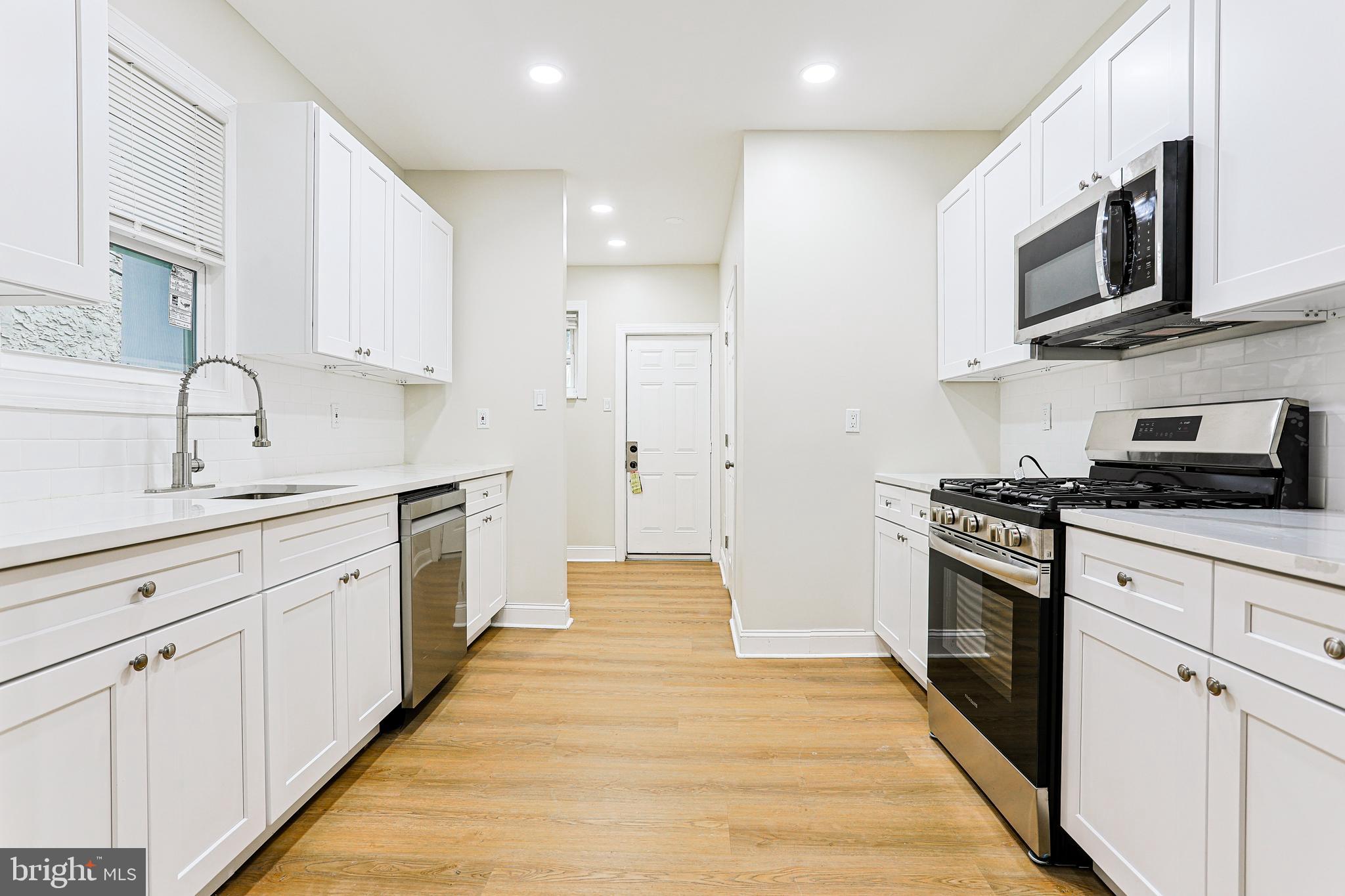 Welcome to 5812 Trinity Street, Philadelphia, PA 19143 — A Stunning Renovation in the Heart of Cobbs Creek! Nearby the Francis Myers Recreation Center. This home qualifies for the first time home buyer grant. It can be yours for almost nothing out of pocket. Inquire by calling here today.
Step into this beautifully renovated 4-bedroom, 2-bath home in the vibrant Cobbs Creek neighborhood and experience space, style, and comfort like never before. Brand new roof and central A/C done in 2025. Boasting approximately 1,500 square feet of tastefully designed living space, this home is perfect for someone seeking generously sized bedrooms, modern upgrades, and abundant storage.
As you enter, you’re greeted by a charming front porch — an ideal spot to relax or entertain during warm summer evenings — and a meticulously landscaped front lawn with colorful flowers and fresh mulch that adds instant curb appeal.
Inside, you’ll find gleaming white oak plank flooring throughout, white shaker-style cabinets in the fully updated kitchen, gorgeous countertops, and sleek stainless-steel appliances that make both everyday living and entertaining a delight. Every detail has been thoughtfully curated from top to bottom.
The home features four spacious bedrooms with ample natural light, and two full bathrooms — one with a walk-in shower and another with a full bathtub located conveniently in the second-floor hallway.
The partially finished basement offers soaring ceilings and versatile space — perfect for transforming into a recreation room, home gym, or additional storage area.
Enjoy the bonus of a nice-sized backyard, offering endless possibilities for outdoor gatherings, gardening, or play.
Don’t miss your chance to own this move-in ready gem in one of West Philadelphia’s most beloved neighborhoods!
