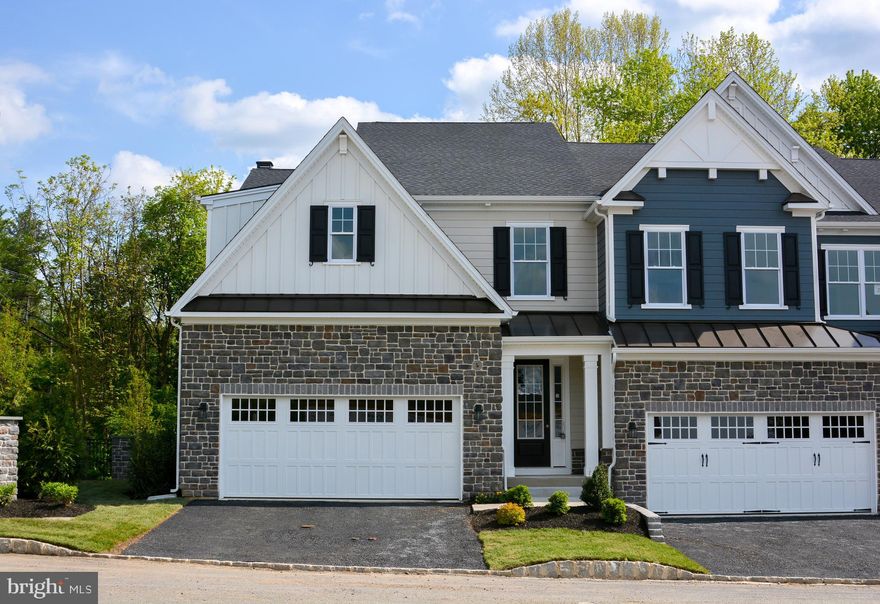 Move in now and save over $38,000! This Designer Showcase Home will be ready for a September/October move-in and is located on a desirable walk-out basement homesite! The Berkeley's open-concept layout is ideal for those that love to entertain family and friends, featuring an oversized dining area with large box window and relaxing great room with a cozy gas fireplace. Airy 9' ceilings, designer hardwood flooring, and abundant natural light flow throughout the entire 1st floor, highlighting the exquisite openness of this end home design. The chef-inspired kitchen is the center of attention with its white 42" furniture-grade Century Kitchens cabinetry with soft-close doors and drawers, quartz countertops, top-of-the-line GE Cafe appliance package, extended Elite island, designer ceramic tile backsplash, and spacious walk-in butler's pantry. From the kitchen, access to the 23' x 11' covered Trex deck can be found. A private powder room and convenient mudroom can also be found on this level of the home. Oak staircase treads and stately American Craftsman posts, railings, and balusters then guide you to the 2nd floor of the home, where the private owner s suite is sure to impress. This luxurious getaway features an airy cathedral ceiling detail, dual walk-in closets, and luxurious owner s bath, featuring a dual sink quartz vanity, oversized frameless glass shower, and designer ceramic tile package throughout. 2 additional bedrooms with private en-suite bathrooms & large walk-in closets and a walk-in laundry room are also found on this level of the home. Visit us to tour this gorgeous Designer Showcase Home for yourself!
