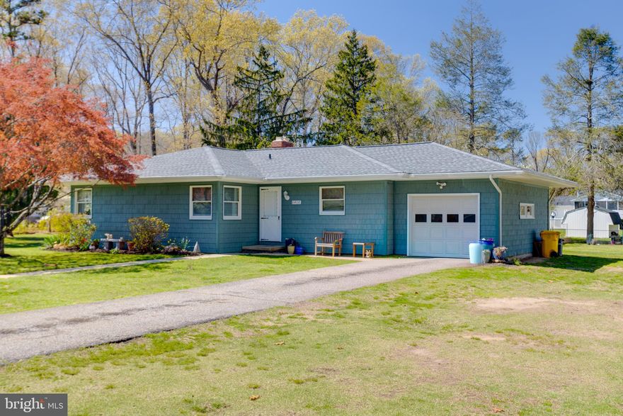 This beautiful home features 3 bedrooms, 2 full bathrooms, and 1 half bath. The updated kitchen offers modern finishes, while the stunning hardwood floors add warmth and character throughout.

The finished basement includes a bonus room that can be used as a home office, gym, or additional living space.

Step outside and relax in your spacious backyard, situated on approximately one acre of land. The detached garage is fully equipped with heating and air conditioning—perfect for working on your car, creating a workshop, or setting up a private home gym.