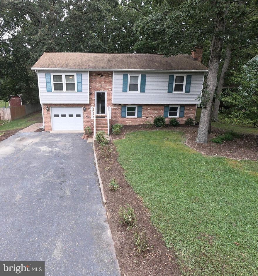 Nestled In The Devonne Woods Community This Gorgeous 4 Bedroom 3 Full Bath, Split Foyer Home, 1-Car Garage With Automatic Garage Door Opener, Neutral Home Décor, Plush Wall-To-Wall Carpeting, Nice Laminate Flooring Throughout, Kitchen Includes Diamond Series Grey Kitchen Cabinets, Beautiful Granite Counter Tops, Deep Kitchen Sink/Faucet, Nice Breakfast Nook, Stainless Steel Appliances To Include Refrigerator, Dishwasher, Radiant Stove/Cooktop & Built-In Microwave Oven, Formal Living Room, Separate Laundry/Utility Room. Skylight In Primary Bathroom Offer Plenty Natural Light, Ceiling Fans Throughout, Central A/C & Heating System, Spacious 2-Tier Deck. Situated On .50+ Acre of Land With Mature Trees For Shade! (NO PETS OR SMOKING PERMITTED!) FIREPLACE DOES NOT CONVEY! Convenient To Nearby Shopping, Schools, Route 1 & 3. All Applicants Must Pay Application Fee $75 Per Adult . Tenant Pays 1st $100 Deductible For All Service Calls. Apply Today!