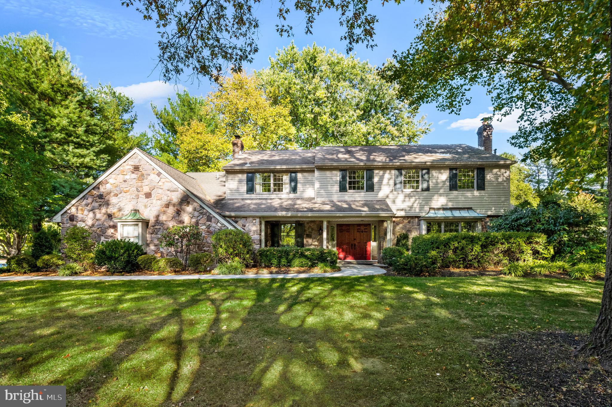PICTURE PERFECT! This 5-star luxury property offers exceptional craftsmanship and
artistic elegance, nestled on a picturesque one-acre lot in sought-after Mirror Lake
Farms. This expanded and meticulously maintained 4-bedroom, 2-1/2 bath home has
been upgraded throughout, blending timeless elegance with modern comfort. The
winding bluestone paver walkway leads to the covered front porch, illuminated with
custom outdoor lighting. Enter through the double front doors into the two-story
entrance where an oak staircase serves as a dramatic focal point. The center hall flows
into the living and family rooms, both accented with crown moldings and recessed
lighting. The living room exudes charm with a bay window, built-in seat, and wood-
burning brick fireplace. Rich oak hardwood floors on the main and upper levels add
warmth and sophistication. The inviting family room, perfect for gatherings, features a
custom white-washed pine accent wall, wood-burning brick fireplace, built-in bookcases,
and French doors leading to the rear terrace. Adjacent to the family room, a wet bar with
custom cabinetry, granite and tile countertops, beverage center, sink, and recessed
lighting is ideal for entertaining. The professionally designed gourmet kitchen features
high-end appliances, including a 5-burner Thermador cooktop with stainless-steel hood,
Thermador double ovens, Sub-Zero refrigerator, Sharp microwave, Bosch dishwasher,
and 2 pantries. Custom cherry cabinetry, dual sinks, and a peninsula with seating
provide ample space for cooking and gathering. Pendant and under-cabinet lighting
enhance the ambiance, while a French door opens to the bluestone terrace. The adjacent
breakfast room, bathed in natural light from a bay window, features porcelain tile floors
and a custom chandelier. The expansive dining room, accessed by pocket French
doors, features oak hardwood floors, tray ceiling, crown molding, linen closet, and a
custom chandelier, setting the perfect ambiance for hosting. Tucked away on the main
floor is a home office with built-in bookshelves, along with a mudroom, stylishly updated
powder room, and a convenient first-floor laundry room featuring a utility sink and
custom cabinetry and offers easy access to the 2-car attached garage with workbench
and stairs to attic storage. A separate door leads outside to the brick walkway. The
spectacular backyard features 2 terraces connected by a bluestone walkway, surrounded by
mature landscaping, creating tranquil spaces perfect for socializing. A fenced garden,
potting shed, and vibrant plantings add to the natural charm. Upstairs, the serene
primary suite offers crown molding, custom window treatments, ceiling fan, and linen
closet. The en-suite bath features a vaulted ceiling, Velux skylight, dual granite vanities,
spacious tile shower with rain and handheld fixtures, whirlpool soaking tub, heated towel
rack, and private water closet. Adjacent to the primary bath is the dressing room with
vaulted ceiling, window, and Elfa Décor Birch custom closet. Three additional oversized
bedrooms feature ceiling fans and ample closets, one with a built-in window seat. The
hall bath features a fully tiled tub/shower combo, Corian counter, and a linen closet.
The spacious finished basement offers exceptional versatility with baseboard heat, built-
in cabinets and closets, recessed lighting, and egress with skylight. The unfinished area
provides abundant storage and houses high-efficiency systems, including a Carrier heat
pump, Aprilaire air filter, humidifier, and Carrier Infinity Smart thermostat. This home is
in pristine condition and move-in ready. Benefit from easy access to I-95, Philadelphia,
Princeton, and NYC, while enjoying all the charms of Historic Bucks County living. Walk
to Lower Makefield Shopping Center and enjoy convenient access to the new Wegmans
in the Prickett Preserve Town Center, plus restaurants, shopping, and recreational
activities in Yardley and surrounding communities.