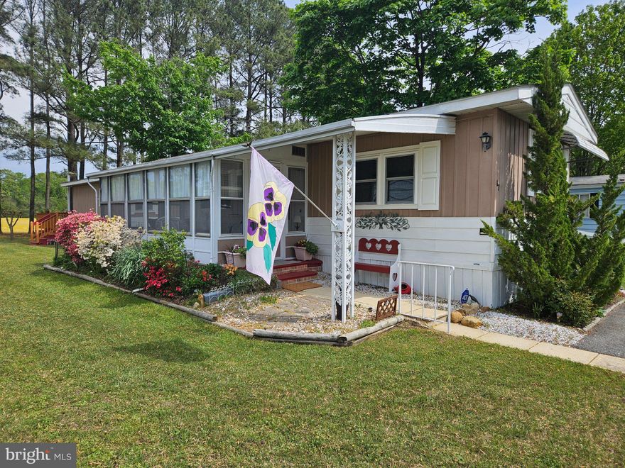 Come see this charming home located in the sought after 55+ community of Hyde Park a Sun Community in Easton.  This home offers lots of updates throughout.  Major improvements: new roof (2017), Heat pump (2023) A/C unit (2017) Beautiful Laminate flooring (2017) New deck and sliding door (2017) Some new vinyl windows (2022) New Shed (2017), All newer appliances within 5 yrs to include washer and dryer.  Additional upgrades include: Resurfaced Driveway (2020) Upgraded interior lighting (2017) Repainted interior & exterior (2018) New exterior shutters (2022) Upgraded landscaping & exterior lighting (2017).  You will find the location in the park unbeatable as it backs up to beautiful trees and views of open farm field beyond!  A large rear deck offering a private, functional, and inviting retreat for relaxing and entertainment or just enjoying your morning coffee!  A wonderful sunroom offers added living space and with a little heater can be used year round.  The ample kitchen boasts plenty of cabinets and work space along with a breakfast bar. Some community amenities include: Club House with exercise room; inground pool; covered pavilion; gazebo; disc golf course; dog park; walking paths; fishing pond and rv & boat storage.  Just minutes to local shops, stores, restaurants and all Easton has to offer!