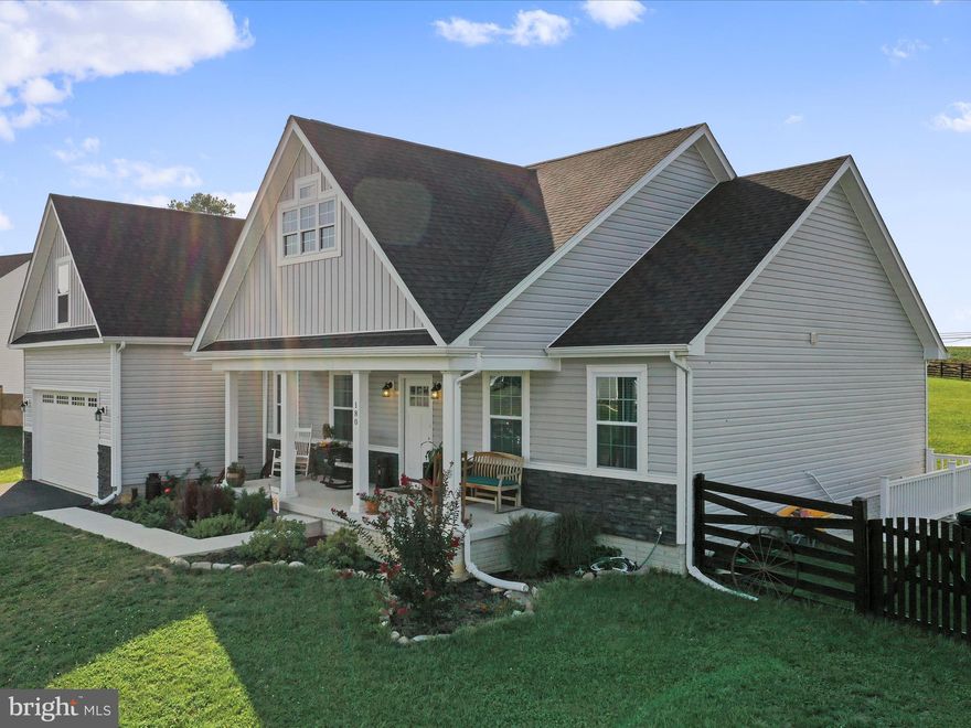 Charles Town (Charles Washington's town) is showing off this Gorgeous 2022 Margaret Model in Milton's Landing built in 2022: the community is now sold out. This beautiful Arts and Crafts fusion Ranch Home boasts 4 large bedrooms, 3 1/2 Bath and over 4011 total square feet. With an Open Floor Plan and Spacious Open Eat in Kitchen, the layout is livable and flows beautifully with the Master Suite separate from other bedrooms. The Loft Bedroom en suite has separate heat and AC system for a self-contained Guest Room. Custom luxury vinyl plank flooring is a dream to clean and maintain. Gourmet kitchen includes gas stove, stainless steel kitchen appliances, and Bianco Diamante granite counters. Vaulted ceilings, newly fenced back yard with new back deck and pergola are but some of this home's features.  Sterling Grey siding, Stone water table white cabinets, brushed nickel fixtures and a huge lot with views to the distant views to the train make this a must-see home. With so much natural light from the banks of windows (and there are lots of them) you will enjoy views to the private backyard from the Master suite, kitchen, living room and bedrooms. Spacious two car heated garage leads to a well-appointed laundry room. Boasting a full 4011 square feet, you'll enjoy 2125 Square feet of finished living space on the first floor and loft Bedroom en Suite, and 1886 unfinished square feet on the lower-level walk out. A total of 4011 square feet of perfectly planned living space on 1.13 acres is a balance of peace and tranquility and is minutes from Historic Charles Town.  Further landscape your new yard to create a spectacular oasis on 1.13 acres.  HOA is minimal at $300 yearly. This lovely community is perfect for morning or evening strolls, nature hikes or just relaxing by the firepit on those chilly nights.
If you want energy and retail then shop, dine and amble through the many historical buildings, and retail space in downtown Charles Town just a few minutes by car.  Close to major commuter routes WV340, WV81 and MD15.  You are also an easy quick drive to Harpers Ferry, Frederick, Point of Rocks and Shepherdstown.
A bit of History! Founded in 1786 by George Washington's brother Charles, Charles Town has a rich history that includes Jefferson County City Seat(1801),  a Critical Civil War town, and an educational center of western Virginia with the founding of the Charles Town Academy for Boys in 1787.

Open House Saturday September 28th 12:00PM -3:00 PM. See you there!