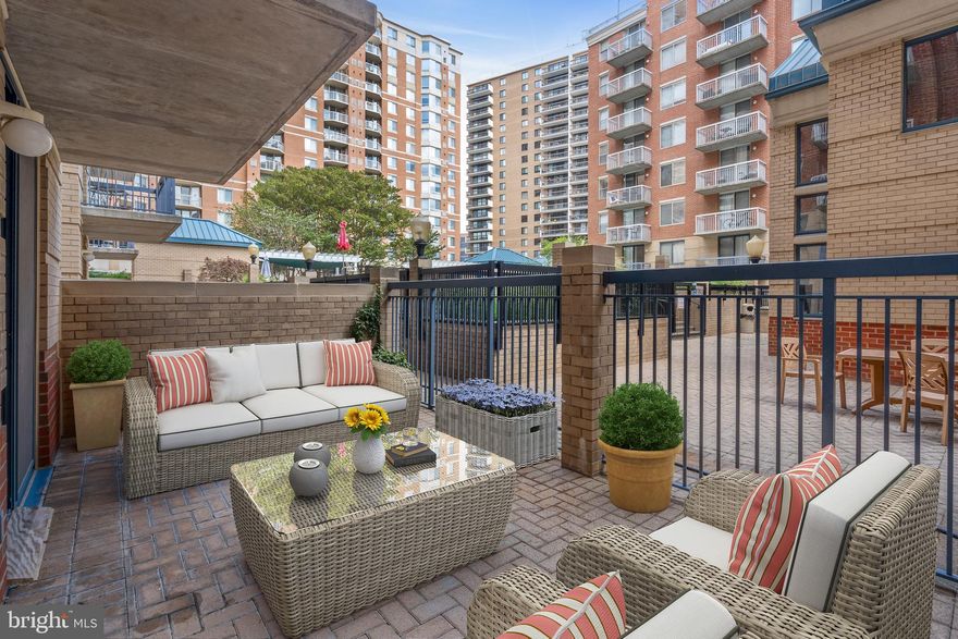 Gorgeous, updated one-bedroom, one-bath condo with nearly 250 square feet of private outdoor patio space located in the highly sought after Lexington Square condo community. This condo is move-in ready! Just bring your things! You'll love the beautiful kitchen which features updated cabinets, countertops and stainless appliances, including gas cooking. Wood floors flow throughout the main living space, bedroom and closet area. This condo also showcases an updated bathroom, updated HVAC, and fresh paint. It conveys with one-assigned garage parking space, and a separate storage bin. Located in the highly desirable Lexington Square condo community with its vast offerings and LOW monthly fees, you'll be within blocks of metro stations and nearby amenities in Arlington's Ballston-Virginia Square neighborhood. Lexington Square is a well-managed, smoke-free, pet-friendly condo association featuring on-site management, daily custodial services, a secure package room, fitness center, party room, picnic area with gas grills and tables, outdoor pool and jacuzzi, bike storage, EV charging station and car wash area. *Some photos virtually staged.*