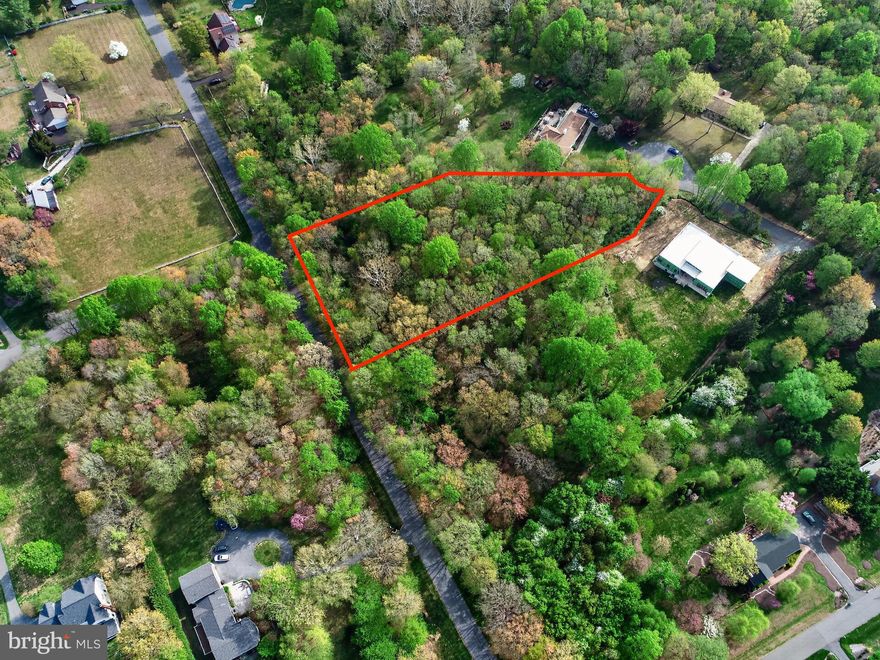 This exceptional 2-acre homesite is perfectly nestled on a quiet cul-de-sac in the highly sought-after Seneca Highlands community.  Nearby new construction homes with comparable acreage have sold in the $1.5M-$2.2M range. Multiple surveys and PERC testing are complete, including approval for a septic system supporting up to 6 bedrooms. Plus, enjoy the rare advantage of public water access and no HOA. Surrounded by peaceful wooded views and featuring a babbling brook at the rear of the lot, this picturesque setting offers the ideal backdrop to custom build your dream home.  Ideally located for both convenience and recreation, the property is just moments from the Darnestown Swim & Racquet Club and Darnestown Local Park, which features sports courts and open green space. Less than a mile to everyday essentials at Harris Teeter, while the vibrant shopping, dining, and entertainment options of downtown Kentlands are just a short 10-minute drive away. Commuters will appreciate the easy access to Darnestown Road (Rt 28), Seneca Road (Rt 112), and I-270, making it easy to enjoy a private retreat without sacrificing convenience. Beginning with the 2027-28 school year, assigned schools will be Darnestown ES, Kingsview MS, and Poolesville HS (verify with school board).