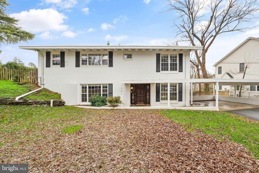 Welcome to Grass Ridge, a suburban haven in McLean, 22101! This charming bi-level single-family home offers a perfect blend of comfort and style. As you enter, you are greeted by a spacious rec room featuring a warm wood-burning fireplace, a den, and a full bath—a perfect space for relaxation and entertainment.

Head upstairs to discover a large modern concept kitchen/living area adorned with vaulted ceilings and wood floors. The living area boasts a second wood-burning fireplace, creating a cozy ambiance. The kitchen is a chef's dream, with sleek black granite countertops, white cabinetry, stainless steel appliances, and recessed lighting—perfect for culinary enthusiasts.

The primary bedroom with a full bath and, two additional bedrooms with a shared hall bath complete the upper level. Step outside to a large deck overlooking a beautiful backyard, complete with a quaint little shed—ideal for outdoor gatherings and enjoying nature.

Grass Ridge is a close-knit community of around 100 homes, nestled between Westmoreland and Old Dominion, north of Kirby Road. The neighborhood borders Kent Gardens Park, offering scenic trails and Pimmit Run, providing a serene "away from the big city" feel despite its proximity to Downtown McLean, Arlington, and Falls Church.

Kent Gardens Recreation Club is a nearby gem for recreational activities. Downtown McLean offers a plethora of options, from dining at Pulcinella Italian Host to grabbing a quick lunch at Sweetgreen or Sweet Leaf Café. For a more formal dining experience, explore Capri Ristorante Italiano or J. Gilberts. Grocery shopping is convenient with Giant Food, Balducci’s, and The Organic Butcher nearby.

Venture into Arlington, where Lee Heights Shopping Center houses the delightful Pastries by Randolph for a sweet treat. Falls Church, known for its friendly atmosphere, hosts a Saturday farmers market and offers biking opportunities with access to the W&OD trail at the end of Westmoreland Street.

Whether you're drawn to the tranquility of Grass Ridge, the amenities of Downtown McLean, the culinary delights in Arlington, or the charm of Falls Church, this home is your gateway to a vibrant and well-connected community. Don't miss the chance to make this bi-level beauty your own!

Property sold as is