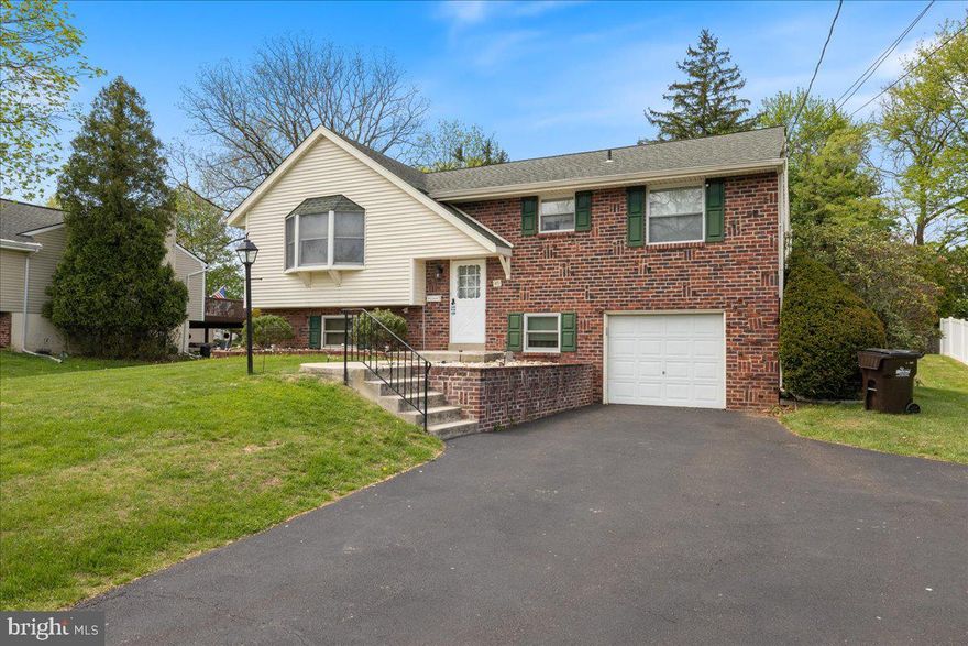 This split level is waiting for a new family to come in and make it their own - Hardwood floors on the main floor including the 3 bedrooms -  Updated eat in kitchen that opens nicely to the dining room as well as the huge living room.  4 Bedrooms (One in the lower level) and 2.5 Baths and over 2000 sq. ft of living space in the highly sought after Palomino Farms.  Lowest Level offers the large  Family Room with a fireplace with a great view of the yard, a bedroom and a half bath with plenty of storage and inside access from the garage - Walk right out to the back yard at ground level for ease of entertaining on the patio and spacious back yard  - Award Winning Central Bucks School District.  Easy access to major roadways.  Floor plan is also available - this property will not last so act fast - Total convenience to all shopping - Its a real Gem.