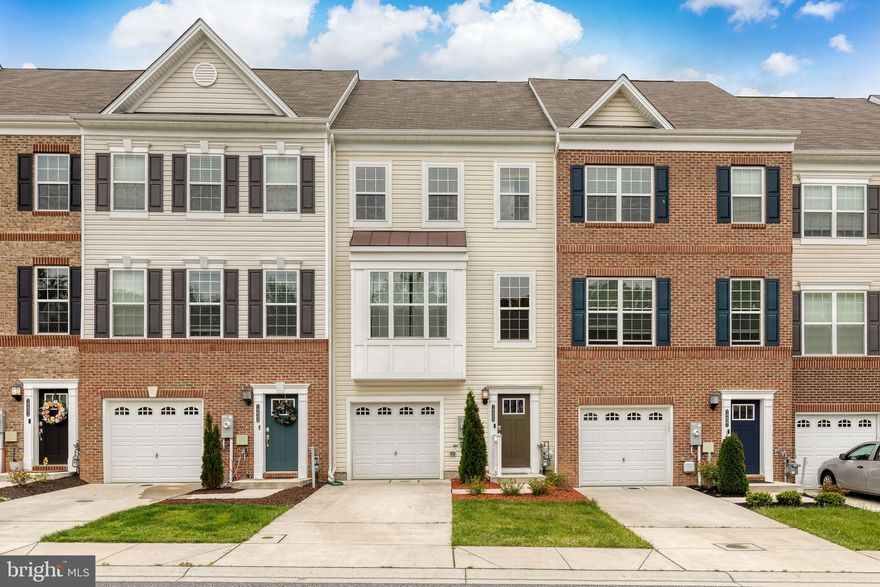 MAJOR Price Improvement!  Welcome to 1235 Astounding Lane in the beautiful, almost new, community of Beechtree Estates.  This stunning home offers all the bells and whistles you are hoping for.  The first level has a 1 car garage with plenty of extra guest parking.  There is an oversized family room on this level with a powder room and a walkout to the backyard.  The next level offers an expansive open floorplan with a deluxe luxury chef's kitchen.  There is gorgeous dark wood cabinetry, granite countertops, custom subway tile backsplash, a breakfast bar, a center island for added prep space, built in microwave drawer,  gas cooktop with a custom range hood, double wall oven, a slider that leads out to the trex deck, and luxury vinyl plank floors that span the entire level.  The bedroom level has a sumptuous primary suite with a barn door slider to the private bath with double vanity and a custom tiled shower.  The additional two bedrooms are spacious with great closet space.  Enjoy the incredible community amenities: fitness center, pool, meeting room.  Live close to APG, and convenient commuter routes, shopping, restaurants, and more!