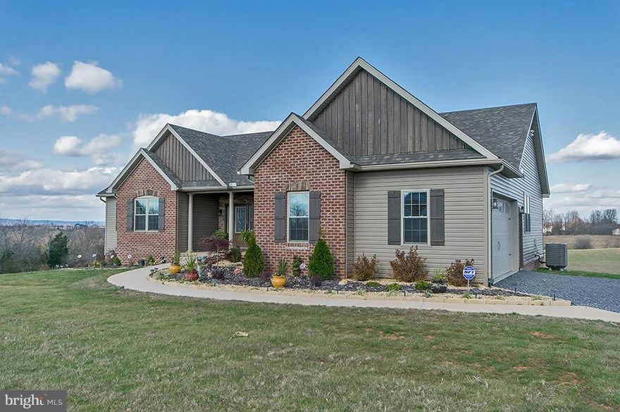 Only 2 years old, this wonderful ranch style home with full unfinished walk out basement has wonderful features.Hardwood, crown molding, ceiling fans, recessed lighting, tiled shower Frigidaire Gallery appliances, walk in closets, separate office, wonderful stone WB FP, 9' ceilings, front porch, rear deck and 3 acres of privacy on a cul-de-sac lot. Easy commute to Rte. 9 and onto N. Virginia