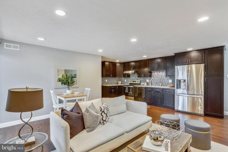 Amazing 2nd floor 2 bedrooms w/den and 2 full bathrooms!! You will fall in love with the space and what you can do with it.  expanded living room w/ open concept kitchen，the gleaming premium quality engineered hardwood floor throughout， open living room,  gourmet kitchen with plenty of counter space. Enjoy your morning cup of coffee on your own private balcony off of the living room.  A cozy den can be your kid's or study room. The over-sized Master bedroom has an en-suite bathroom with updated features, walk-in closet. There is an additional good size bedroom and bathroom. laundry in the unit!! low condo fee, including water and maintenance. Large windows provide great brightness and makes this unit so modern and welcoming!! Fantastic location just blocks to i270, walmart, tons of shops, groceries, good eats and much more!!