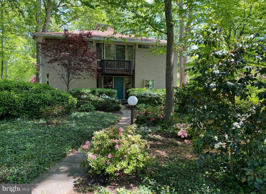 This fabulous mid-century modern home is nestled in a tranquil wooded setting, offering the perfect escape from the bustle of everyday life while still well inside the Washington Beltway. The property features a serene shade garden complete with a calming water feature, enhancing the peaceful ambiance. The fenced backyard provides privacy, while the treehouse-like feel of the house creates an inviting atmosphere for relaxation and outdoor enjoyment.<p>

The main level features large living and dining rooms, butlers pantry and a gourmet kitchen, complete with a full sized refrigerator, separate full sized freezer and a walk in pantry. This level is completed by a large office/sitting room which could serve as a main level bedroom, powder room and a wrap around deck, seamlessly incorporating indoor/outdoor living and dining.<p>

The second level, with lofted ceilings, features a spacious primary suite and two large additional bedrooms, each with their own private bathrooms.<p>

The lower level includes a large rec room, laundry room and a full in-law or nanny suite, which comes equipped with its own kitchenette large bedroom and full bathroom.
<p>
Situated on a quiet cul-de-sac, this home offers off-street covered parking, ensuring convenience and security. A wraparound deck provides an ideal space for entertaining or simply enjoying the view of the surrounding nature. The home also has direct path access to Glen Echo Heights Park, allowing for easy outdoor adventures.<p>

Located in the sought-after neighborhood of Mohican Hills, this home offers easy access to top-rated schools, shopping, dining and recreational amenities. This home is perfectly located for those who commute into DC (2.5 miles from the DC border), or Virginia (easy access to I-495). Shopping and many great restaurants are also nearby, Sangamore Shopping Center is the closest (2.3 miles), and soon to be finished and currently under construction Westbard Square (2 miles). Enjoy nearby an extensively renovated community pool with a playground, nature trails, kayaking, and easy access to major commuter routes. This home is also in close proximity to historic Glen Echo Park (1 mile) and tennis courts at Cabin John Park (3 miles). Easy access is found to the nearby C&O towpath which connects to Georgetown and the DC area.<p>

Mohican Hills Pool membership can be conveyed for a fee, allowing you to skip the 10-year waiting list!