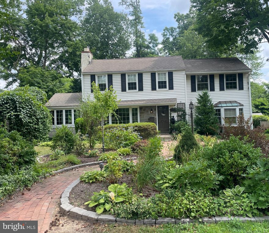 Welcome to this charming 4-bedroom, 2.5-bathroom gem in the heart of Yardley Borough within walking distance to town.   Located in the highly acclaimed Pennsbury School District.  Although this home may be a  diamond in the rough, some fresh paint and hardwood floors throughout add a touch of elegance and warmth to every room.  The spacious living room features a cozy fireplace, creating a warm and inviting space.  The kitchen is equipped with a glass cooktop stove, sleek granite countertops, and solid wood cabinets.  Step outside to find a beautifully landscaped yard with a charming brick walkway. The sun porch and large deck offer a perfect vantage point to take in the views of the expansive rear yard.  A full basement provides plenty of storage space or potential for future customization.  This home combines desirable layout with an exceptional location, making it an outstanding opportunity in Yardley Borough.  Don’t miss your chance to make it your own!