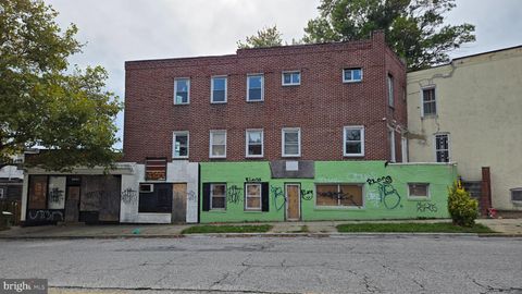 Photo of 1849 E 29th Street, BALTIMORE, MD 21218 (MLS # MDBA2186246)