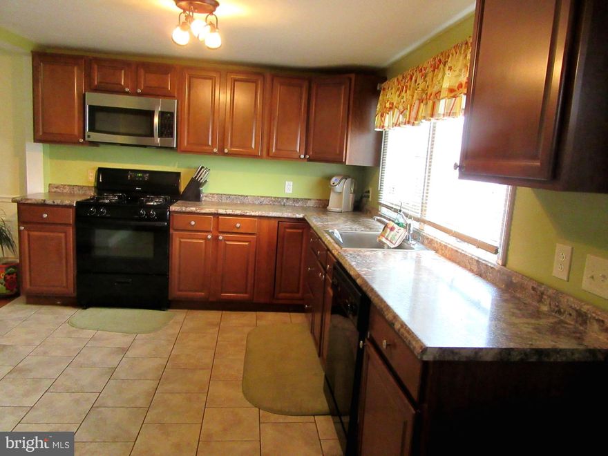 NEW PRICE $$$   This great Cape Cod was  renovated 5 years ago. UPDATED Gas Furnace,  Central Air,  Roof, Dual pane windows and Hardwood Floors on main level with a ceramic kitchen floor. The house shows pride of ownership You will have plenty of  room for storage in the Basement and Garage .   Spacious yard is totally fenced .