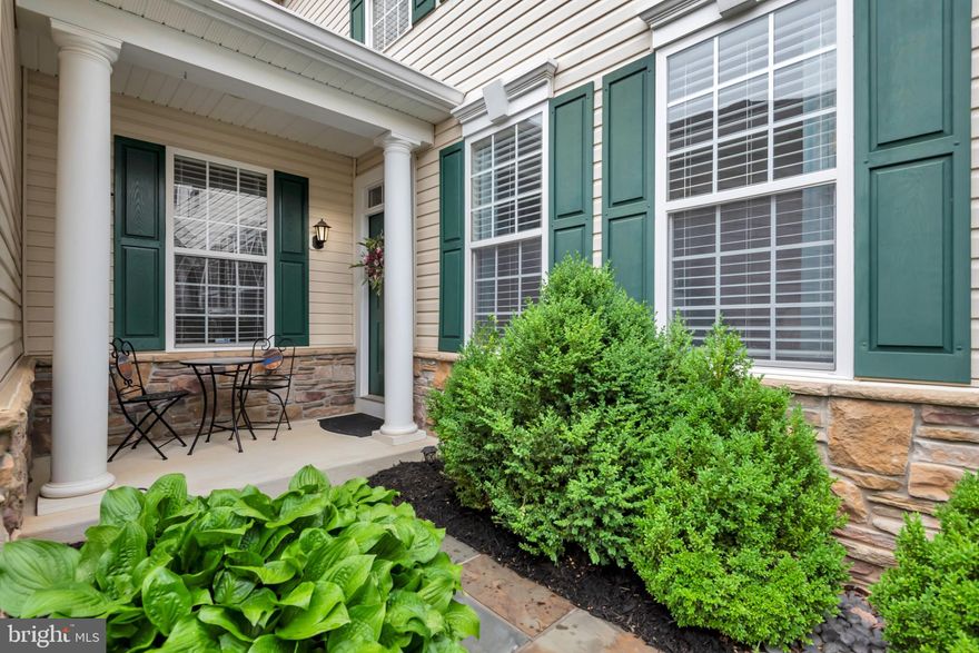 Welcome to 810 Broken Twig Court in the amenity rich community of Piney Orchard.  A beautiful stone walkway leads you to the charming covered front portico, and the oversized 2 car garage gives you an optional interior entry to the home as well.  Enter to a light filled foyer and living room, with the garage mudroom/laundry room also conveniently located by the garage entryway.   The home features high ceilings and gorgeous hardwood floors throughout, with a traditional yet open floor plan.  The spacious dining area has built in cabinetry with display shelves.  An inviting family room with a gas fireplace and well mounted TV is just off the kitchen.  The gourmet kitchen features as gas cooktop, double ovens and a granite countertop with pretty backsplash.  Stainless steel appliances and a nice pantry let you cook and entertain with ease as your guests lounge in the family room.  Open the glass sliding doors to enjoy outdoor dining on the patio that backs to the Piney Orchard Nature Preserve.    The attached over-sized 2-car garage and driveway provides easy parking for up to 4 cars, with additional unreserved parking in the court for guests.  From the garage entry, the connected mudroom & laundry room has plenty of storage and full-size front-loading washer and dryer. 
The second level of the home offers 3 bedrooms with hardwood floors throughout and great closet space.  The primary bedroom is located at the rear of the home overlooking the wooded Piney Orchard Nature area.  Vaulted ceilings, a large walk in closet, and a primary bathroom with both a soaking tub and walk in shower complete this private primary suite.   Two additional bedrooms, each with generous closet space, and a full bathroom with a tub/shower are located on the second level.  The lower level provides even more great living space!!  A large recreation room with another gas fireplace offers another great space to gather and relax.  A full third bathroom is conveniently located on the lower level, and an additional large bonus room is currently  used as a workout space fireplace, but could also be a great home office or overflow sleeping area for guests.  The home systems are located in a utility room downstairs, which also offers plenty of space for organized home storage.  The Piney Orchard community offers ideal location close major commuting routes to both Baltimore and Washington D.C, as well as to Ft. Meade.  The community amenities include a clubhouse, 3 outdoor pools, indoor lap pool w/hot tub, exercise center, walking paths, dog parks, shopping center and so much more!