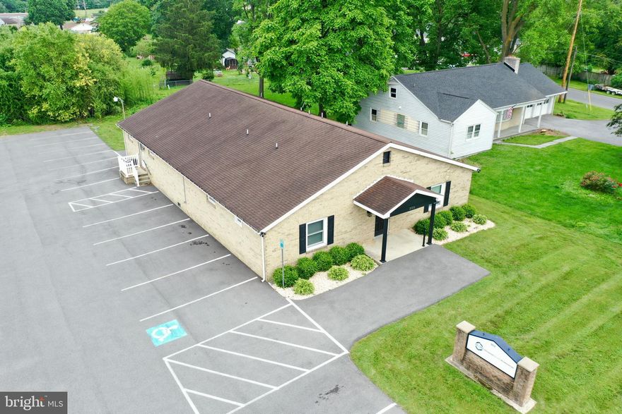 TURNKEY COMMERCIAL OFFICE OPPORTUNITY IN MEDICAL CORRIDOR

Welcome to 302 Rock Cliff Drive — a fully renovated, modern commercial office building in the heart of Martinsburg’s thriving medical corridor. Just minutes from I-81, WVU's Berkeley Medical Center, and this prime location offers unbeatable access and visibility for your business.

In 2022, the current owner took the property down to the studs and transformed it from top to bottom. Major upgrades include:

All-new drywall, electrical, and flooring

Three brand-new HVAC systems with all-new ductwork

Updated to meet current fire code

Repaved parking lot and fresh landscaping

New front windows and entry door

Updated security system and added fiber internet

Stylish modern finishes throughout

The interior layout offers maximum versatility, with 11 individual offices, a conference room, two restrooms, and a kitchenette, making it ideal for professional services, co-working, or administrative operations.

Previously used as a medical office, the infrastructure remains in place for a potential return to medical use — water lines behind the office walls are still present and capped, allowing for easy reconversion to exam rooms or treatment areas.

Whether you're looking for a sleek office HQ, a shared workspace, or a medical suite, 302 Rock Cliff Dr. offers the layout, location, and updates to make it happen.