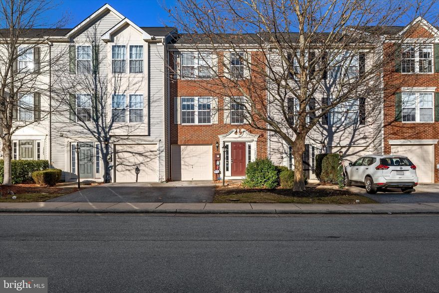 Enter this spacious townhouse with 3 bedrooms and 2.5 bathrooms in the prestigious Fairfax Crossing neighborhood, conveniently located just across from a picturesque park. This splendid residence has been fully bumped-out for maximum space, spans three finished levels and includes the added convenience of a one-car garage. Unwind on the charming deck that overlooks the vinyl-fenced backyard, or on the paver patio below, providing a private oasis for relaxation. The upgraded kitchen with breakfast nook features Corian countertops, an island and pantry, elevating the culinary experience. Separate living and dining rooms adjoin each side of the kitchen. Embrace a lifestyle of convenience and comfort in the heart of Fairfax Crossing and be so close to so many nearby amenities.