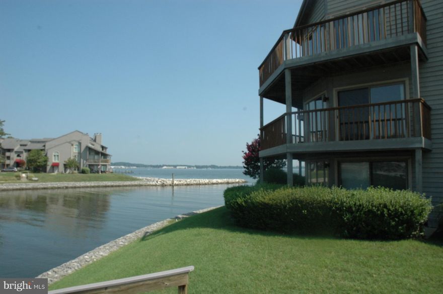 Enjoy watching the sailboats come & go from your fabulous end unit townhome surrounded by water! Freshly painted throughout,  new carpeting, & refinished hardwood flooring on the main level. Elevator on 4 levels! Granite counters in kitchen, 3 wood burning fireplaces, 2 decks & lower patio level. Community pools, beaches, walking trails, tennis, full service restaurant, & marina w/available slips.