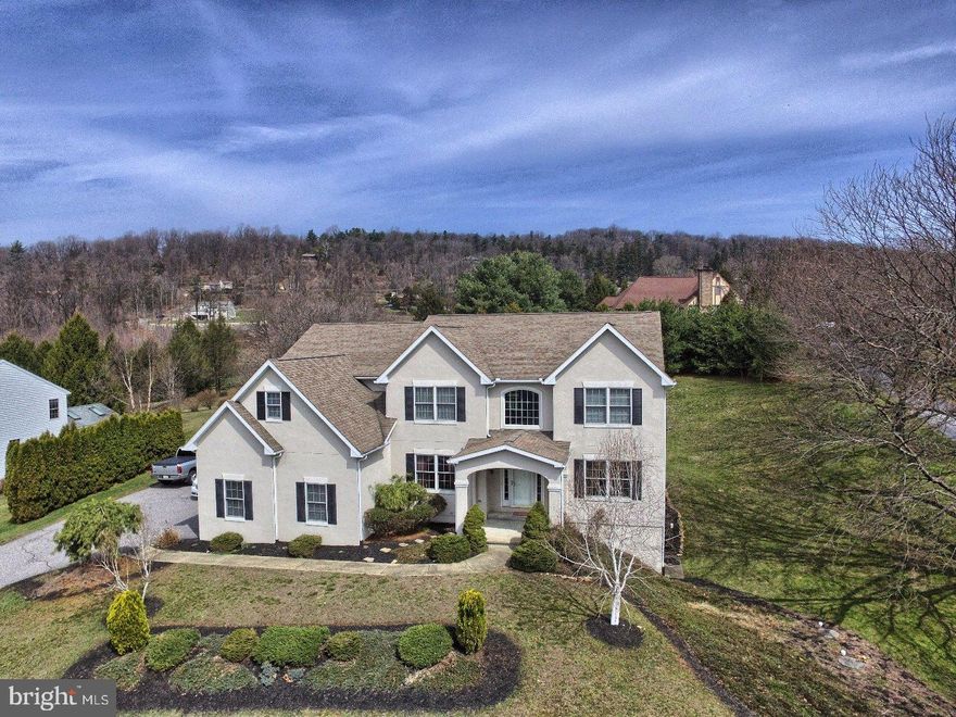 This one is a beauty! There are 5 bedrooms and 5 full bathrooms. Brazilian Cherry hardwood floors on the 1st floor and a 46 handle kitchen. There is a gas fireplace in the two story family room that you can view from the balcony on the second floor. To add to the charm of this home the finished basement is great for entertaining. This home sits on a little over 1 acre along the second hole of Galen Hall Golf Course and has amazing views! Don't take my word for it come see for yourself.