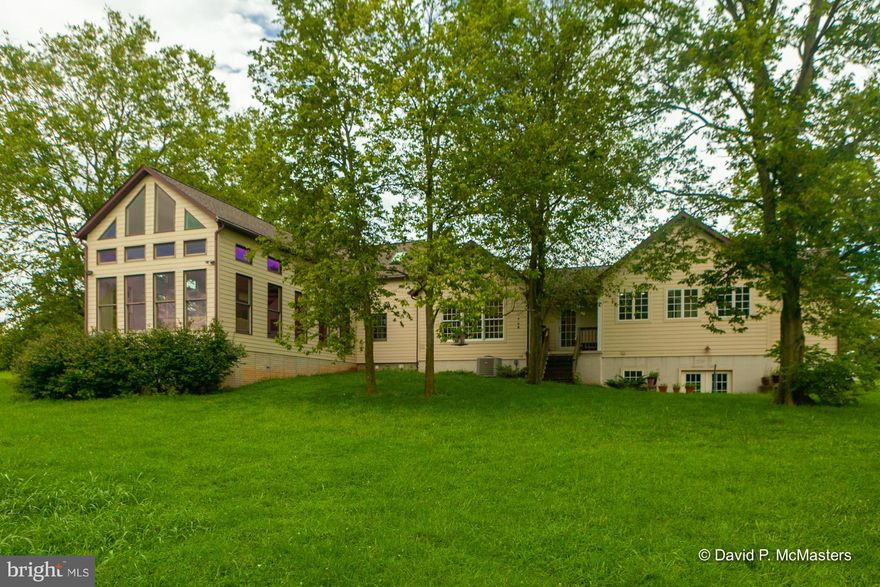 Cedarbrook 36+ acre organic farm. 18th C. Pre- Civil War  2 story log home totally renovated expanded into a gorgeous  contemporary home, original wood floors, fireplace. Fabulous interior rooms, 2008 wing w, stone tile floors, big 1st floor Master Ste, gourmet  kitchen, built-ins, fin. bsmt could be extra BR. 6 car garage/w, loft/office above. 2008 barn 48'x96'.  Long lane.  SecludedExceptional.