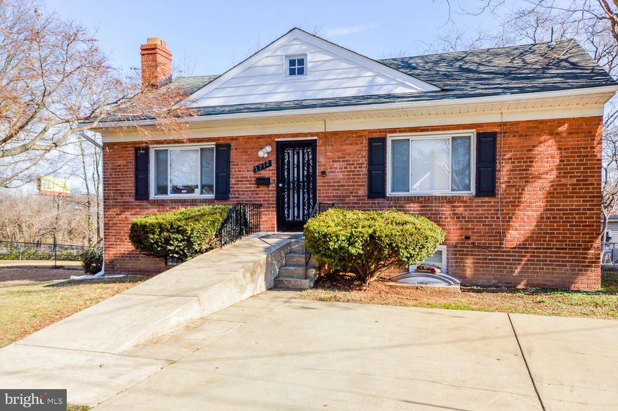Beautiful, completely renovated, brick single family home located in a well-established neighborhood sits on a large 3/4-acre lot with private parking for three cars.  This home boasts 3 bedrooms and 2 fully renovated bathrooms. All three bedrooms have walk-in closets and are newly carpeted. Rich beautiful hardwood floors span the main level with an open floor plan that showcases a cozy fireplace and crown molding that extends through the living and dining rooms. A bonus feature of this lovely home includes not one but two beautifully renovated kitchens on each level. The main level kitchen is bright with natural lighting, beautiful backsplash, stainless steel appliances, and granite countertops. The lower level kitchen, also beautifully renovated, has granite countertops and new appliances.  There is a separate laundry room on the lower level.With recess lighting and new carpet, the recreation room is great for entertaining . It leads to the patio that overlooks the spacious backyard. The shed located in the back yard is useful for extra storage space. Easy commute off 295 and 495 to downtown Washington D.C. and Northern .Walking distance to Metro station and shopping centers .Surrounded by restaurants and grocery stores.Centrally located near several Colleges and Universities.